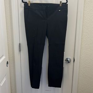 Stretchy clasp professional black striped pants in medium